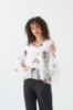 Picture of Woman White handles Ruffle V Neck Chiffon Blouse